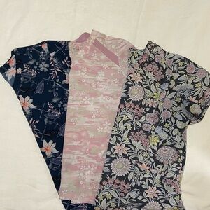 3 Scrubletics Scrub Tops. Patterned. Women’s. Each are an XL.